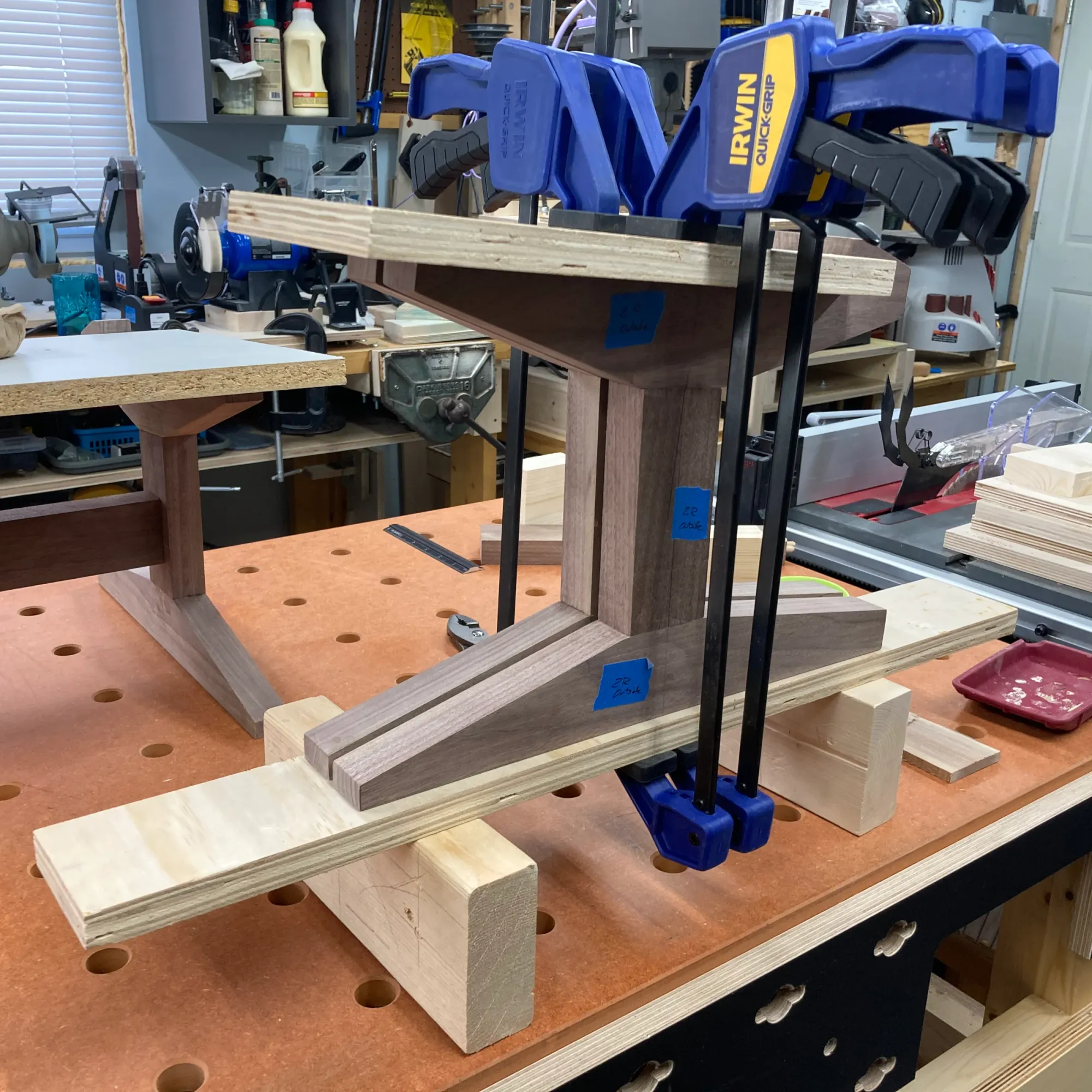 An image showing a simple fixture to keep the leg assembly aligned during glue-up.