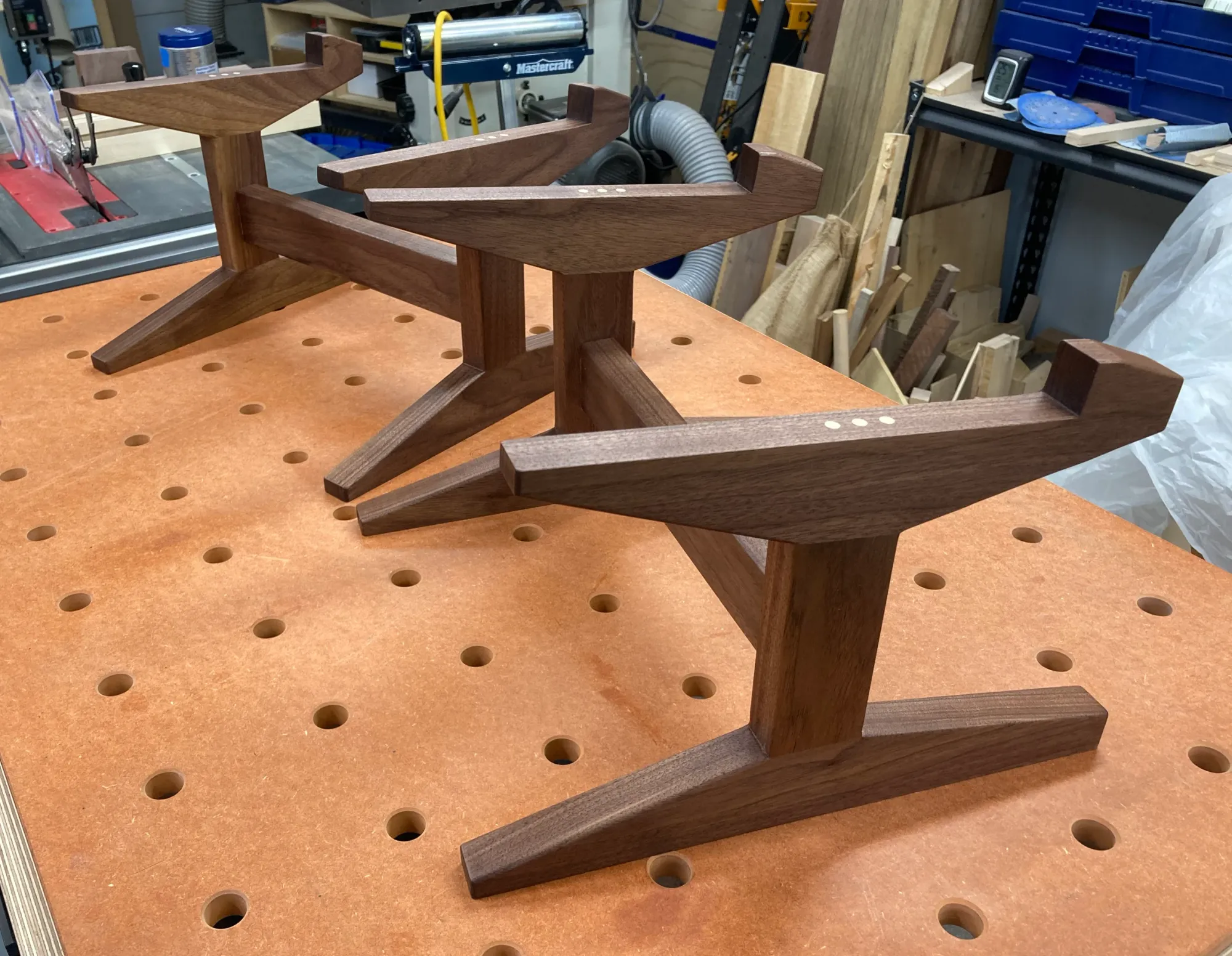 An image showing the speaker stands after applying finish.